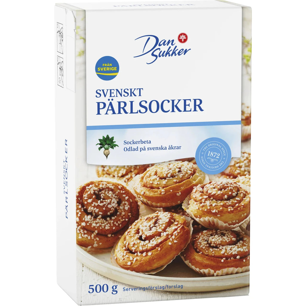 Dan Sukker Svenskt Pärlsocker 500g box – Swedish pearl sugar from Sweden, shown with freshly baked kanelbullar topped with pearl sugar, made by Dan Sukker since 1872
