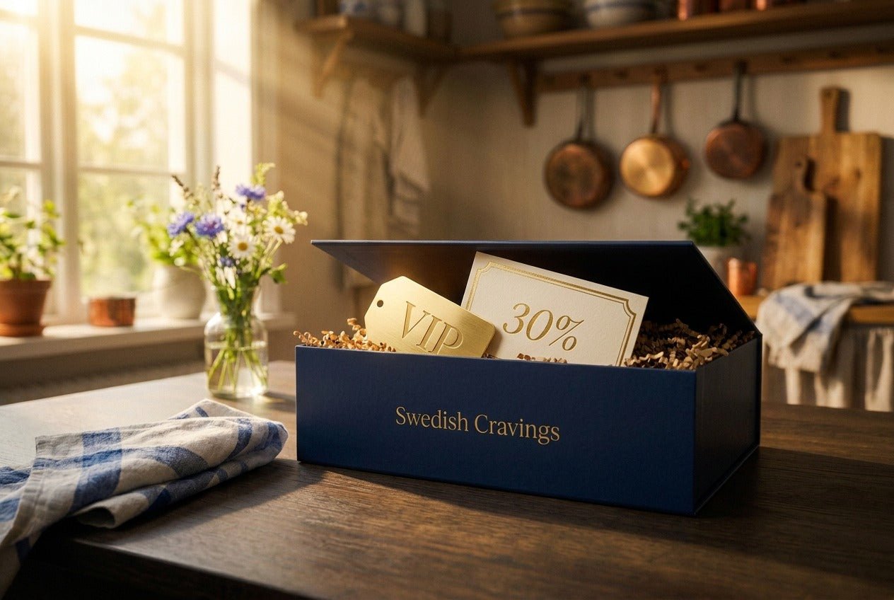 Open Swedish Cravings navy gift box revealing a VIP tag and 30% discount card on a rustic kitchen table